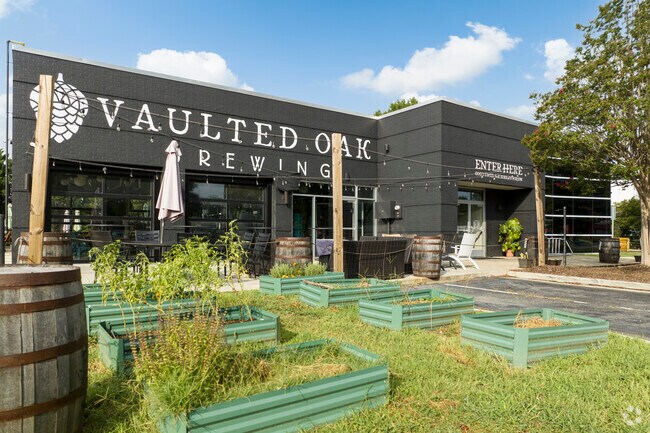 Breweries and restaurants line the retail strip on Monroe Road in Coliseum Drive.