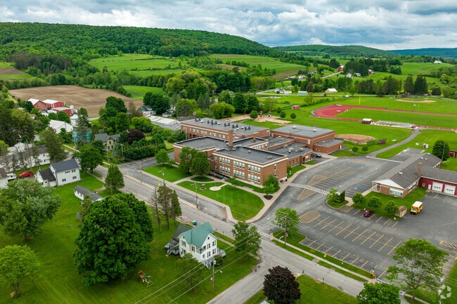 Deruyter High School is in a rural, hilly setting.
