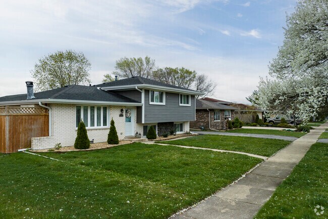 Residents of Justice can enjoy large lots and recessed driveways.