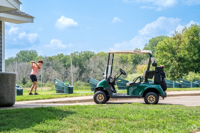 Practice at the driving range at the Chomonix Golf Course in Lino Lakes, minutes.