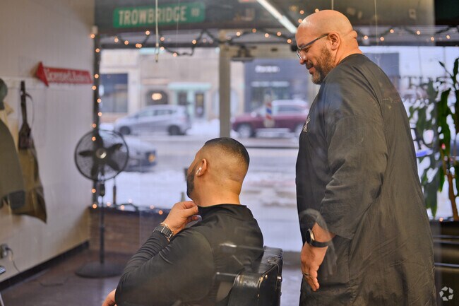 Stop by Cuttin' Up Barbershop in Reo Town for a great haircut and good conversation.