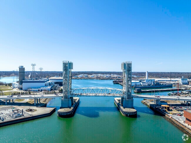 The Weymouth Fore River, Located In Massachusetts Between Quincy And Weymouth, Is Spanned By The Fore River Bridge.