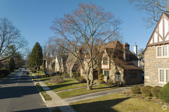 Tudor style homes have stone features on their exterior in Llanerch Hills.