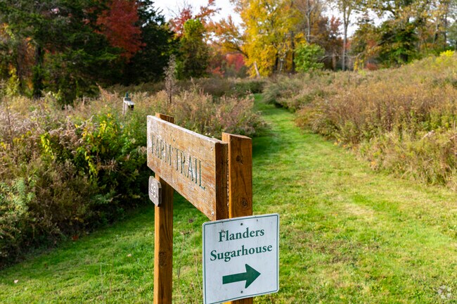 Flanders Nature Center & Land Trust trails are maintained and mix mowed lawn and wooded paths.
