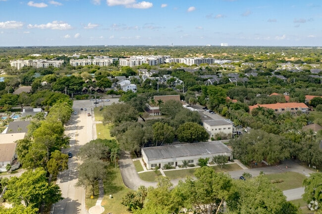 Our Savior Lutheran School in Plantation, FL overlooking multiple home styles nearby.
