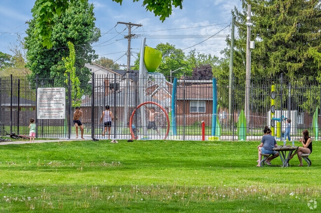 Hemlock Park's namesake park has a new splash pad that neighborhood kids love.