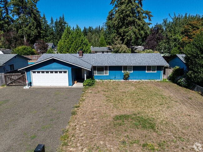 The vivid blue paint job on this rancher home sets it apart from others on the street.