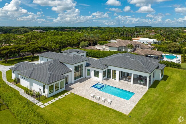 Beautiful new luxurious mansion with a pool in Long Lake, Florida.