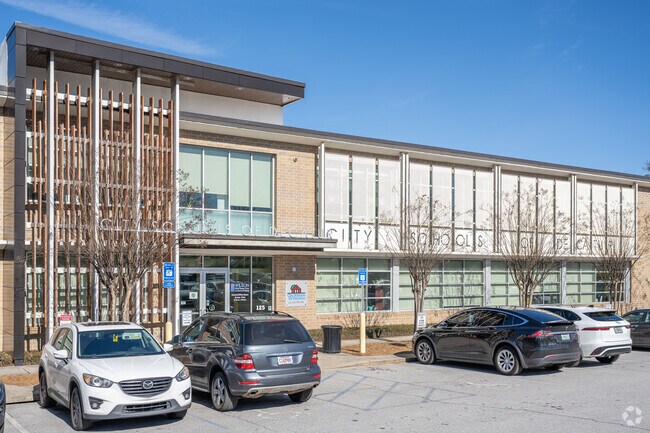 The main office of Decatur City Schools is conveniently situated right next to the local police station, providing quick access to safety resources and community support.