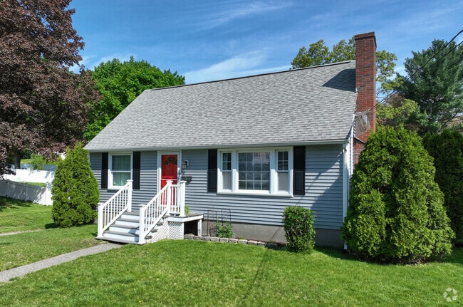 Pine Hill is dotted with classic Cape Cod-style homes, characterized by their steep roofs, dormer windows, and cozy, symmetrical designs that add timeless New England charm to the neighborhood.