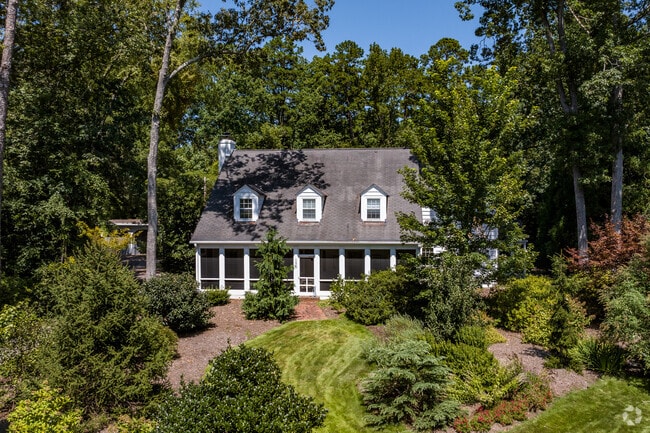 Homes are hiiden by old growth forest in the Duke Forest neighborhood.
