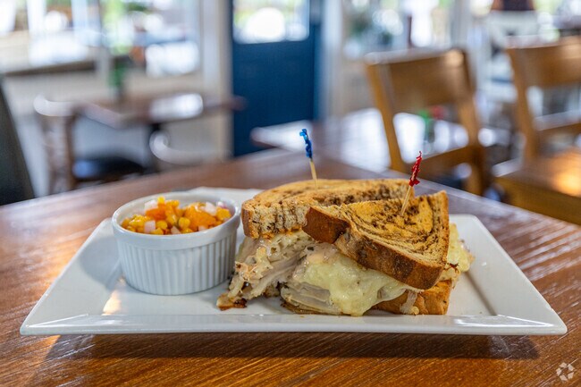 Survey Cafe offers French and American fare near Quail West, with popular items like the Rueben.