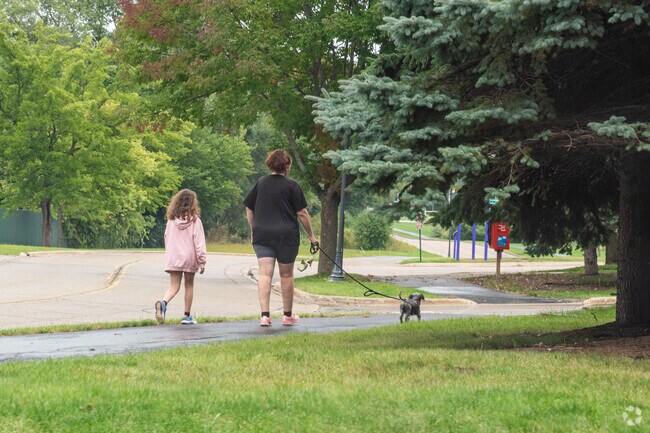 Nippersink Forest Preserve joins the public sidewalk, with access to surrounding communities.