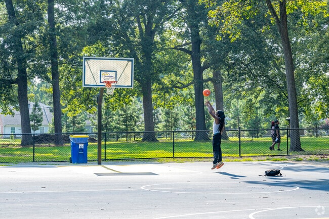 Popular basketball courts sit outside the Pine Camp Arts and Community Complex.