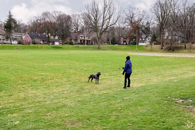 A woman and her canine companion enjoying Edmund Lyon Park.
