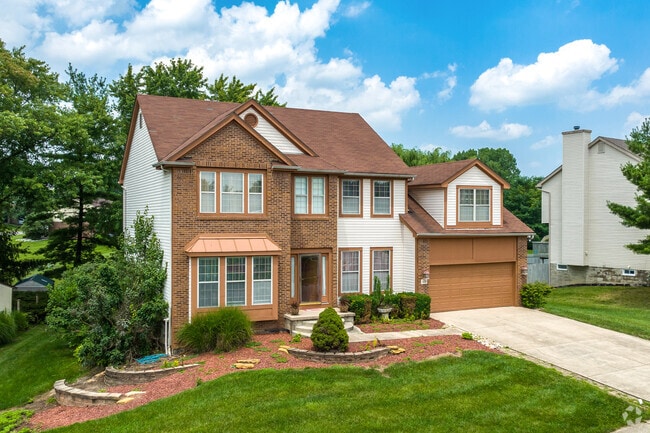 A traditional two-story home in Gahanna-Havens Corners features an attached two-car garage.
