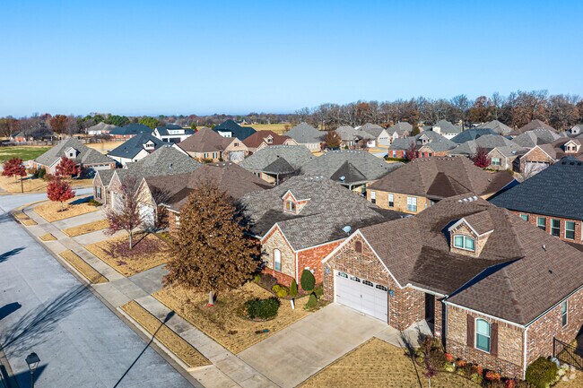 Some Elm Springs homes have built-in garages and are closer to one another.