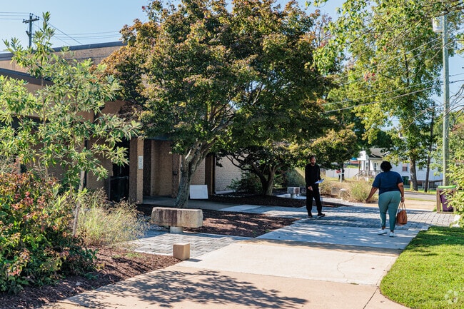 Warwick residents visit the Broad Rock branch of the library to pick up their next adventure.