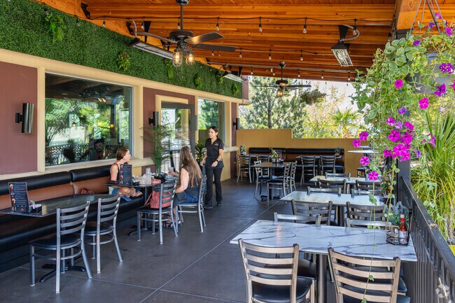 Dine outside with your best friend at El Paraiso Mexican Restaurant in Oak Knoll.