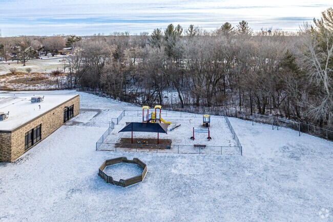 Children enjoy the playground at St. Peter Elementary School.