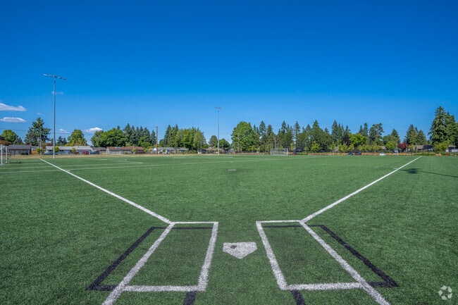 Green baseball field at Brookwood Elementary School in Hillsboro, Oregon.