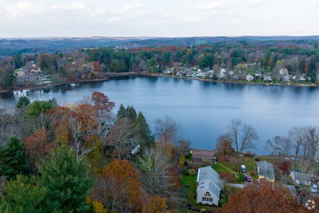 Lake Whittemore has beach access and many houses with waterfront in Spencer. access.