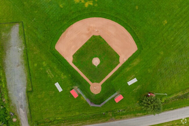 Deruyter Elementary School features a baseball field for students.