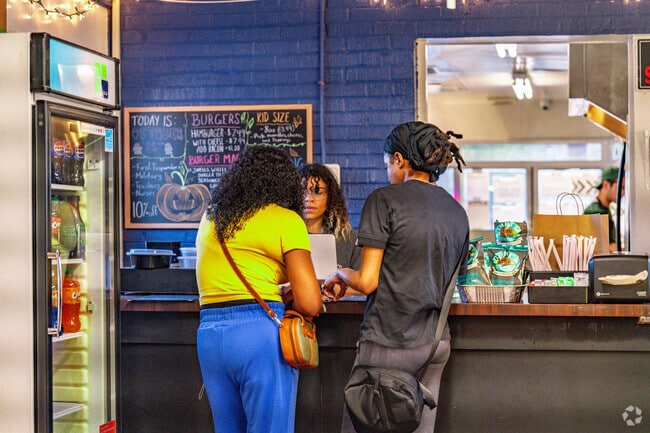 A couple ordering some of the best Mac and Cheese in Jenkins, Virgina.