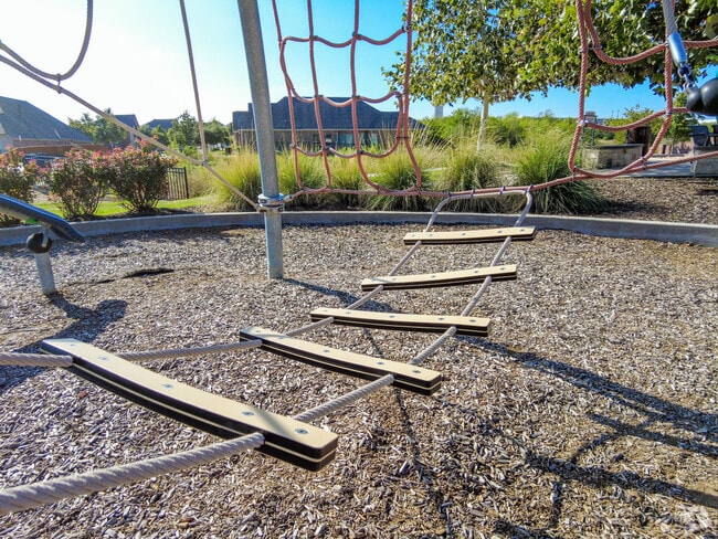 Children enjoy the net ladder at Explorer Park in Maple Creek.