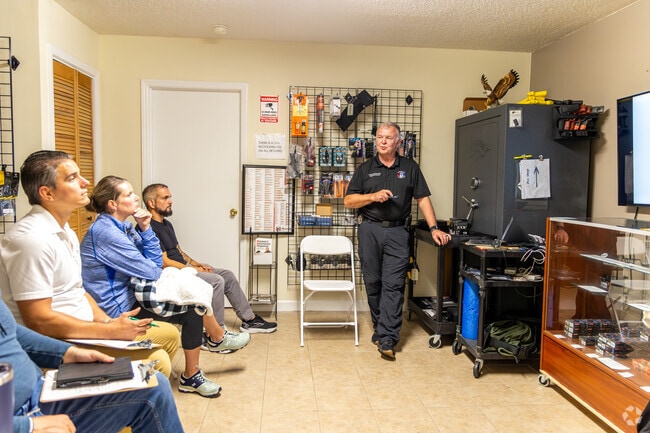 Mecklenburg County Sheriff Irwin Carmichael teaches a concealed-carry class in Northlake.