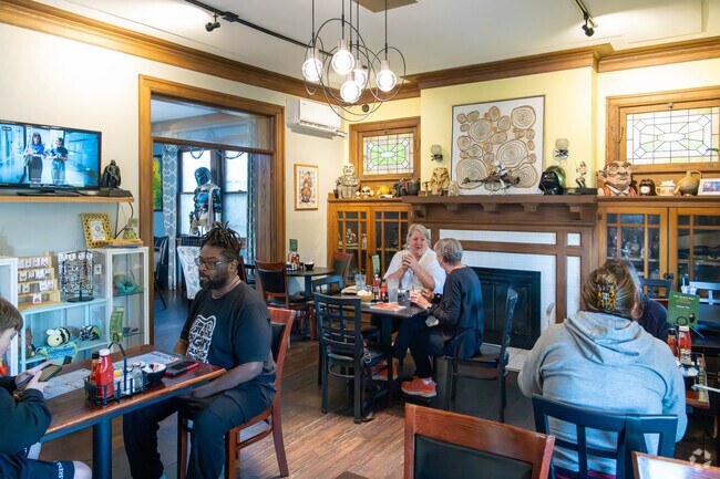 Sherman Residents enjoy breakfast at the Cracked Pot Coffee and Crepes in downtown Middletown.