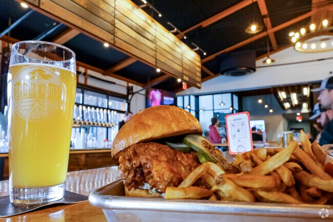 Moreau diners enjoy a robust menu and rotating selection of over seventy beers at Common Roots.