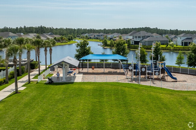 The playground at Beacon Lake’s amenities center features shaded areas, offering a cool retreat from the hot Florida sun.