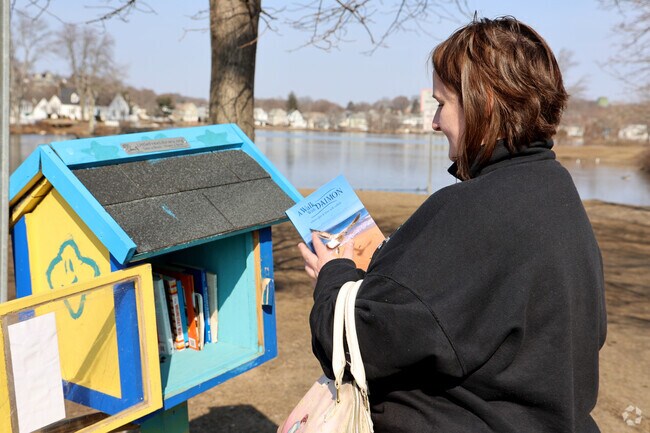 Enjoy a book from the free library at Lower Broadway in Flax Park.
