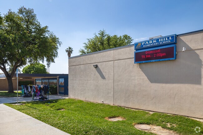 Jackets hang on the lost and found rack in front of Park Hill Elementary School in San Jacinto.