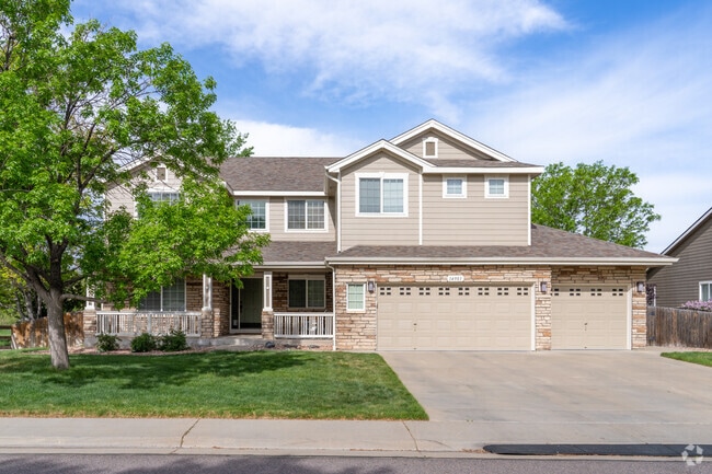 This modern traditional home blends classic charm with sleek updates—where gabled roofs meet clean lines and cozy curb appeal.
