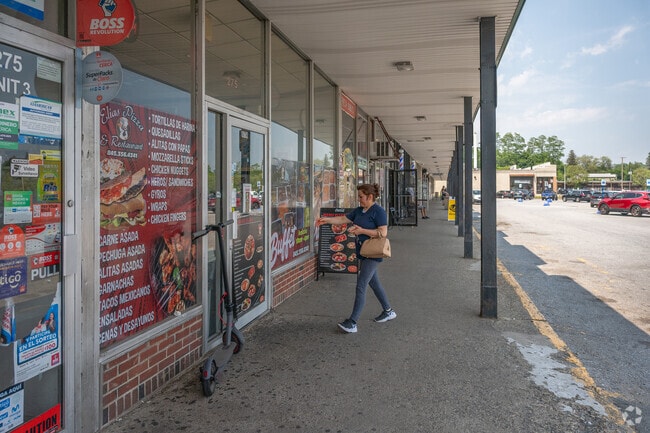The Hillcrest Shopping Center on Main Street features a variety of Latin American eateries such as Elias Pizza & Restaurant.