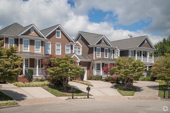 Newly built townhouses line the street of this Red Bank community.