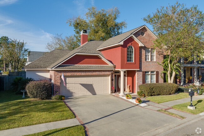 Colorful red homes stand out in Arnould Heights, Lafayette.