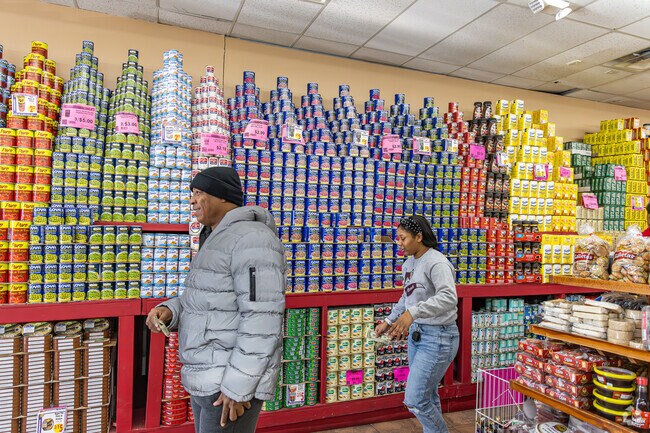 State Street residents enjoy a vibrant community atmosphere while shopping at local markets like Tropical Supermarket.