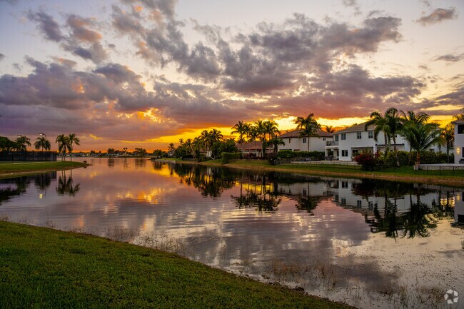 Beautiful everyday sunsets reflected on the water in Sunset Lakes.