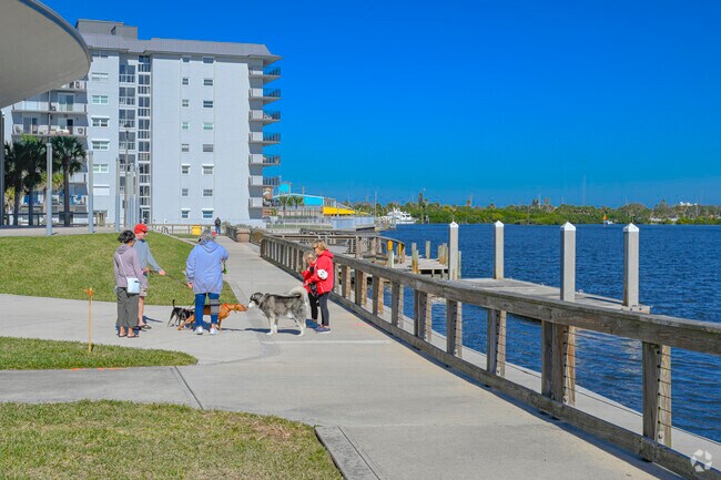 Walk your furry friend along the waterfront at Riverside Park.