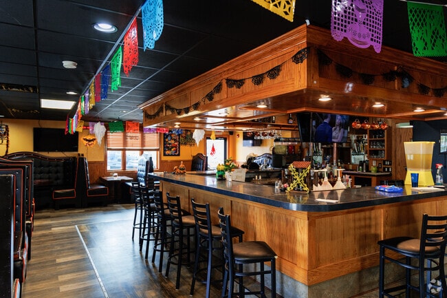 The bar at La Casa Hidalgo serves margaritas and other cocktails.