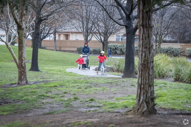 Families go for evening walks at John Kemp Park.