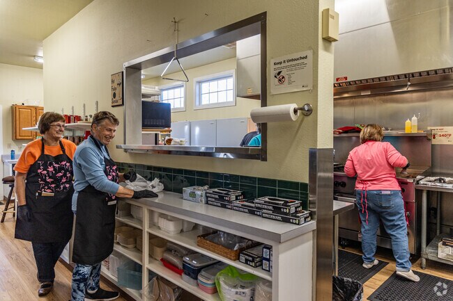 Resident volunteers at The Ryderwood Café cook meals three times a week.
