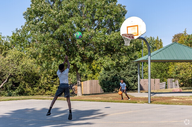locals enjoy playing basketball at Coddington Park.