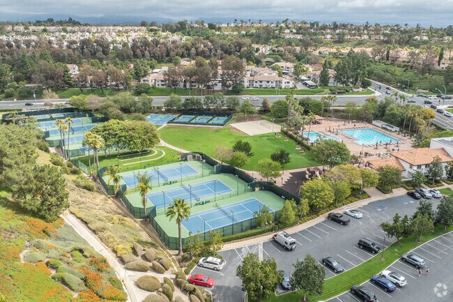 The Rancho Niguel Recreation Club is the main amenities site for residents, with tennis and pickle ball courts, open fields, and a pool.