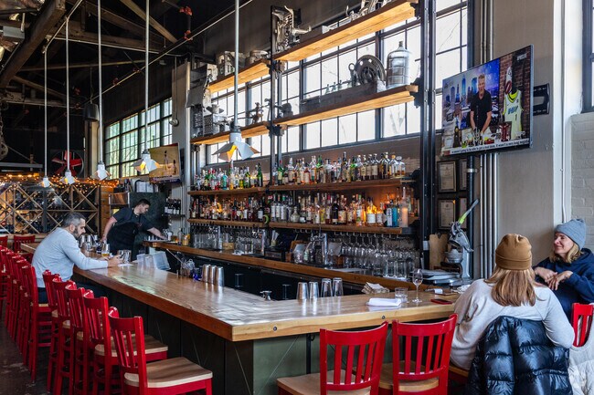 Enjoy a drink and a bite with a friend at Steel and Rye near Brush Hill.