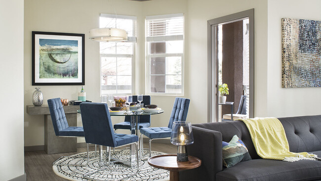 Apartment Dining room with wood floors.