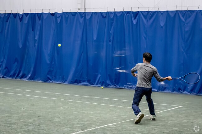 Hit some balls at the indoor tennis courts of Parkwood Sports Comples in Great Neck.